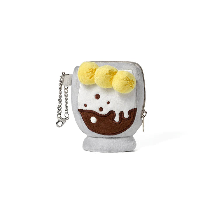 
                      
                        picture showing the pouch keychain made by sunghoon in the shape of an affogato 
                      
                    