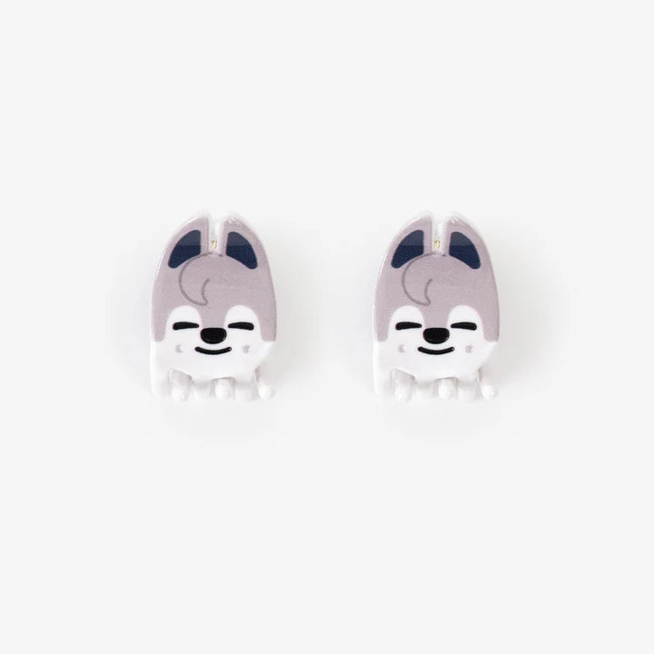 picture of two small hair clips with wolf chan faces