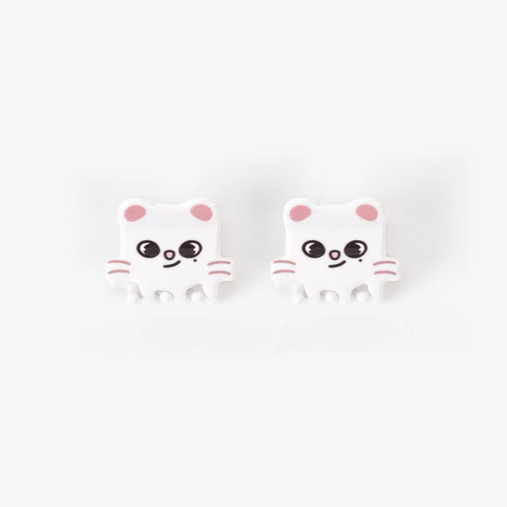 
                      
                        picture of two small hair clips with jiniret faces
                      
                    